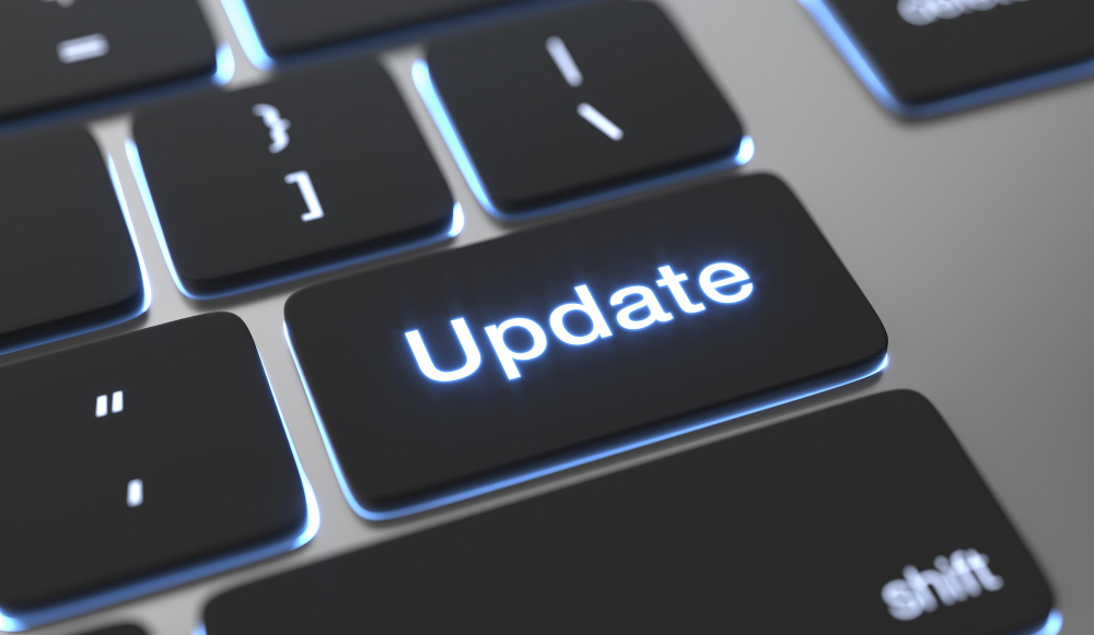 Un clavier avec un bouton update pour symboliser l'importance du patch management